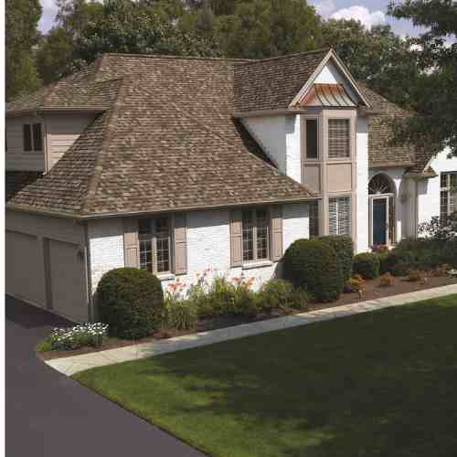 owens corning roofing - customize_sand dune__energy efficiency_installation_ repair_replacement_colr choice_lady on the roof